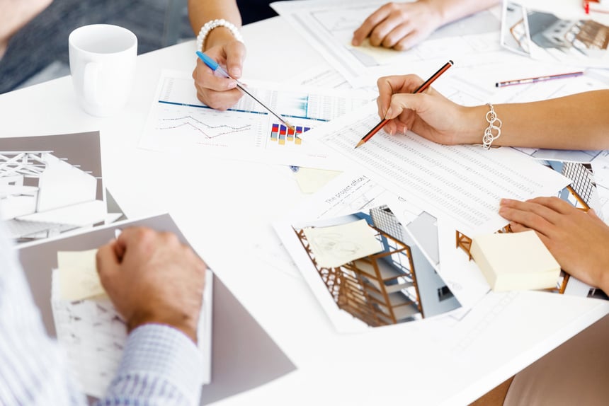 Hands Writing on Paper